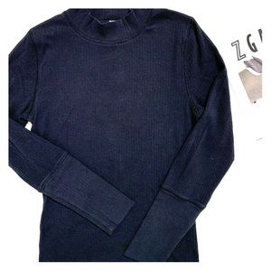 Free People black turtleneck with flaw